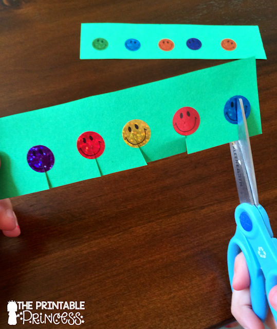 Help your preschool and Kindergarten classroom & homeschool students in developing their fine motor skills with the many great ideas included at this blog post! You'll see ideas for using playdough, scissors, tearing paper, stickers, snap cubes, straw necklaces, pony beads, tweezers, lacing cards, coupons, and MORE! When you want to develop those fine motor skills, the ideas included in this post are a great place to start! {preK and Kinder student, teacher, and parent approved!}